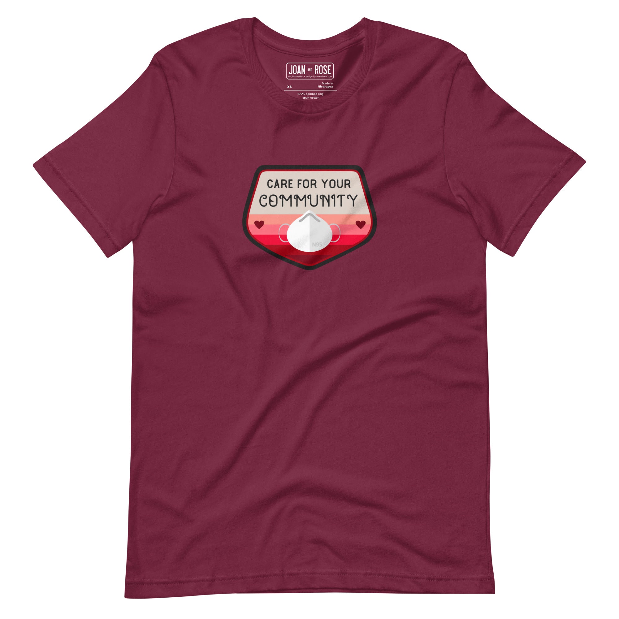 View of Care for your community t-shirt in maroon